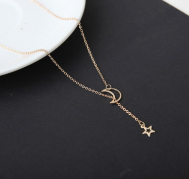 Gold moon and star necklace
