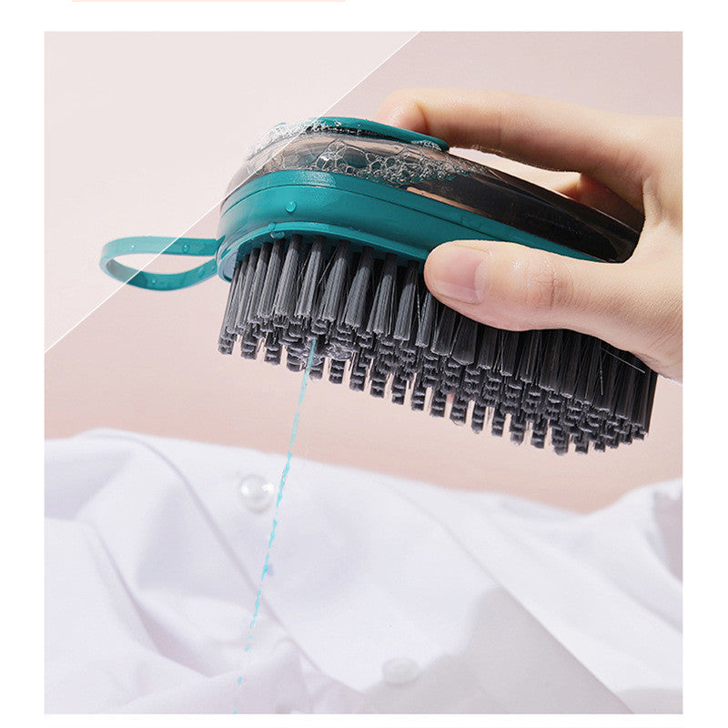 Cleaning a shirt with the soap-dispensing brush