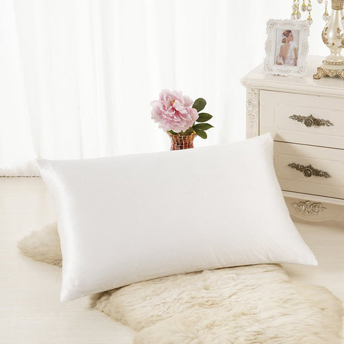 VN Satin Pillowcase on a bed, white satin