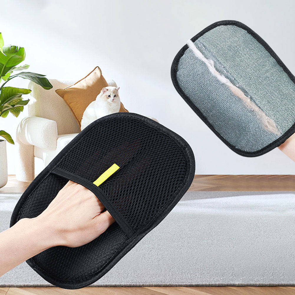 Fur removal mitt on a sofa with collected pet hair