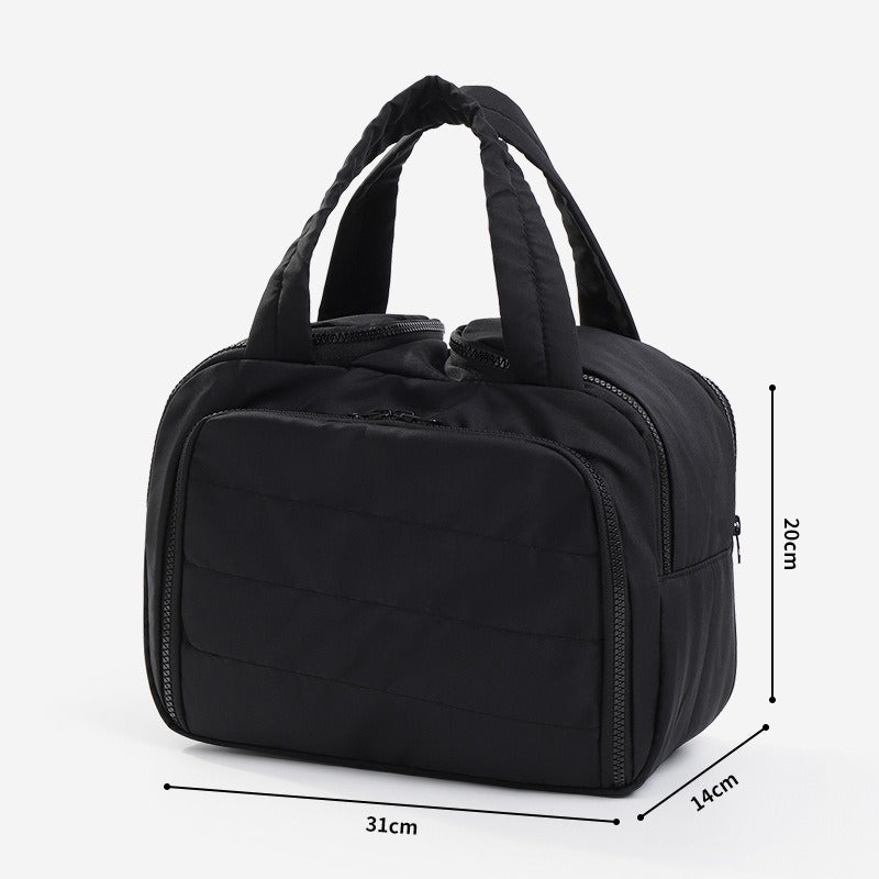 Quilted toiletry bag in black with dimensions