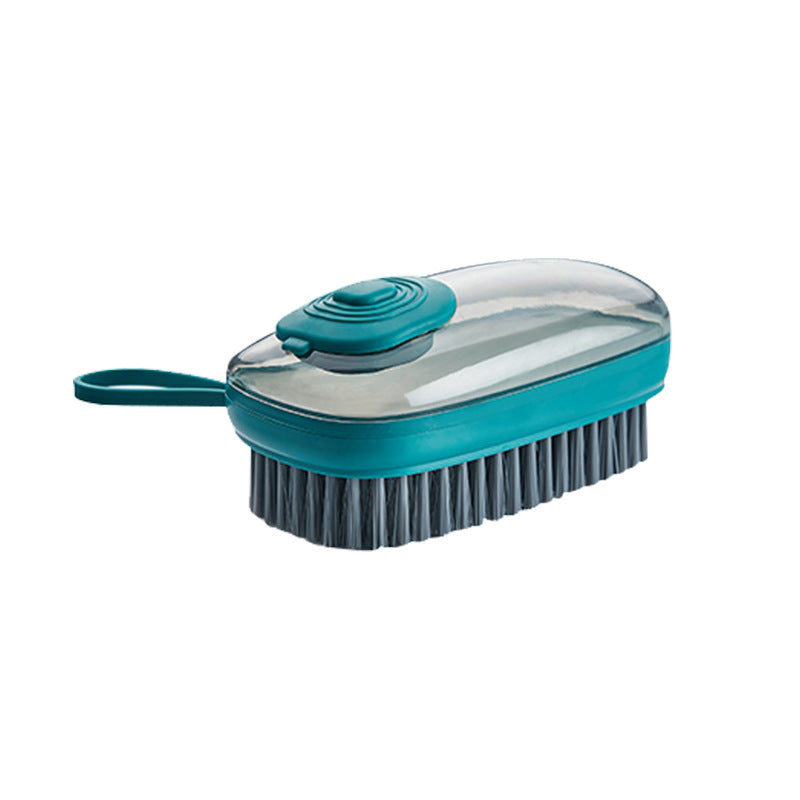 Soap-dispensing scrub brush in green