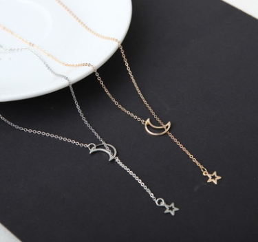 Gold and silver moon and star necklaces