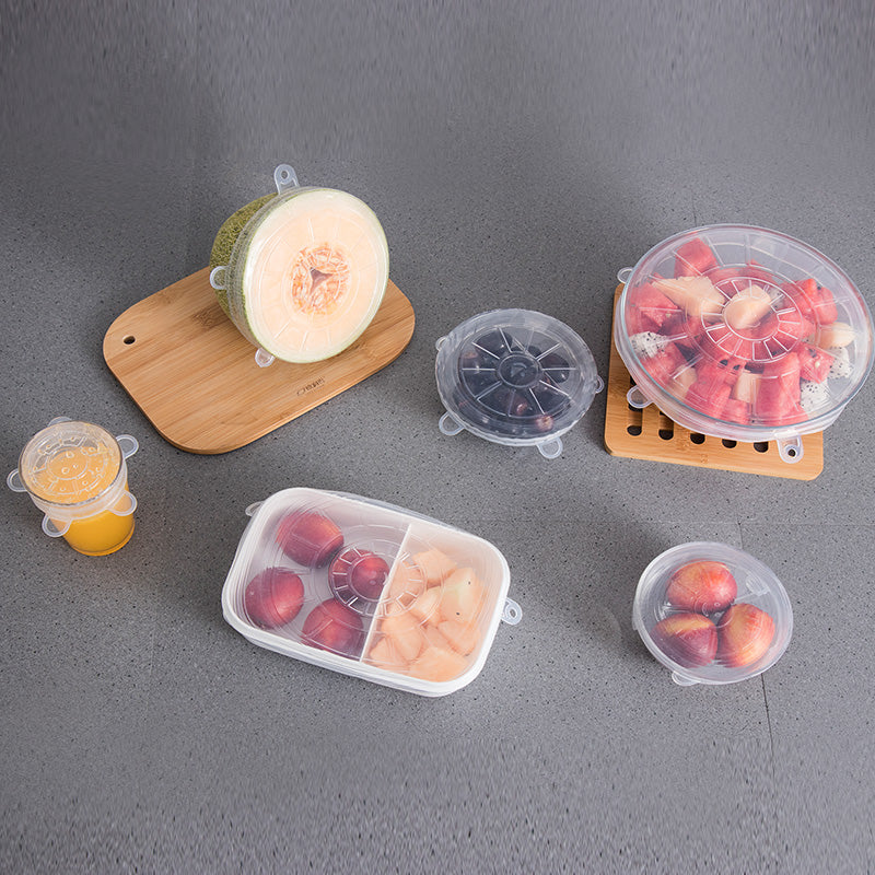 Stretch lids covering fruit and a food container